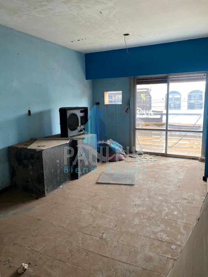 TERRENO CON LOCAL Y HABITACIONES